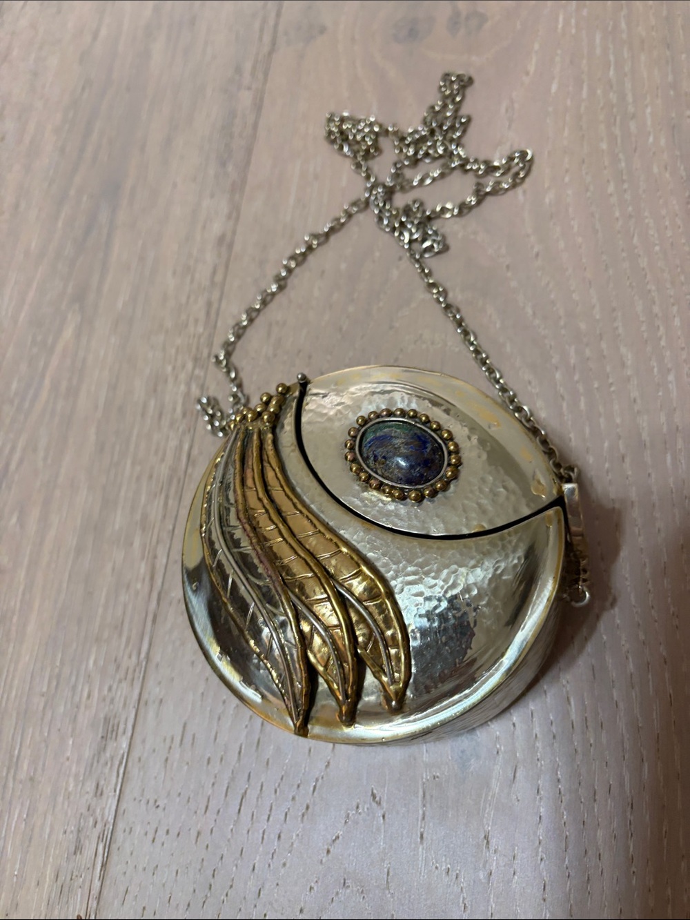 Gold-Tone Round Pendant Crossbody Bag with Blue Stone Accent
